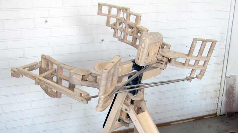 Illustration for article titled Embrace This Wooden Hugging Machine and It Hugs Right Back